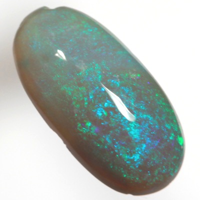 SOLID SEMI BLACK OPAL Sparkles of green over blue, high dome